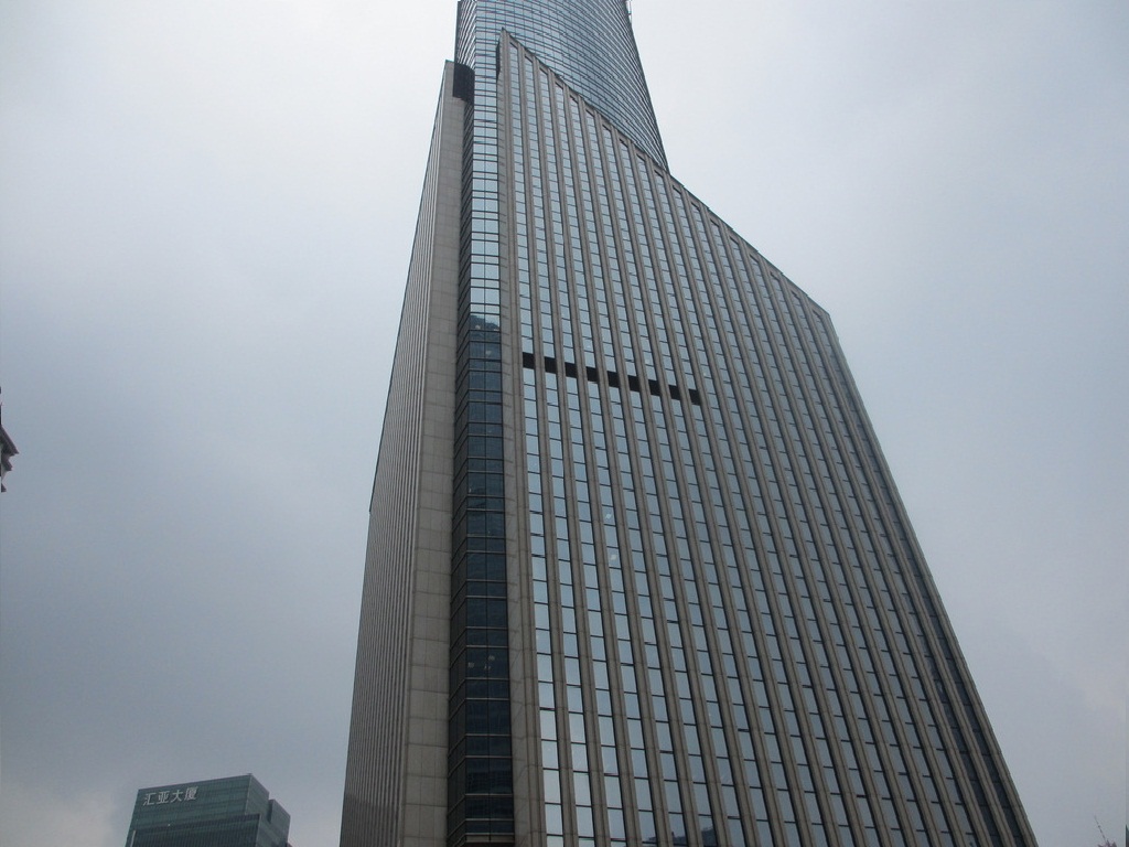 上海金博修建工程请求装置式修建幕墙装置操控体系及办法专利处理异形幕墙“造型精度”与“抗风功能”难以统筹的职业痛点