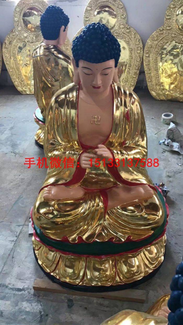 >坐像五方佛贴金   东方阿閦如来即不动佛,属于部族为金刚,手印为触地