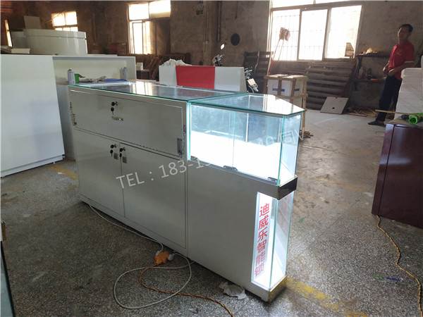 鹤岗东山厂家负责安装爱随智能指纹锁锁架展示柜