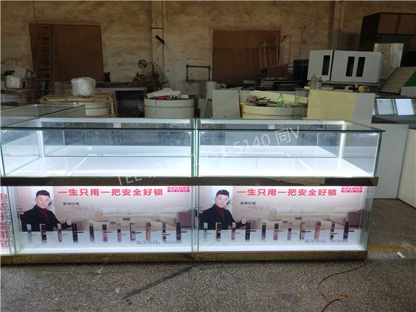 齐齐哈尔铁锋哪里有卖商场柜台的厂家长视智能指纹锁锁架展示柜