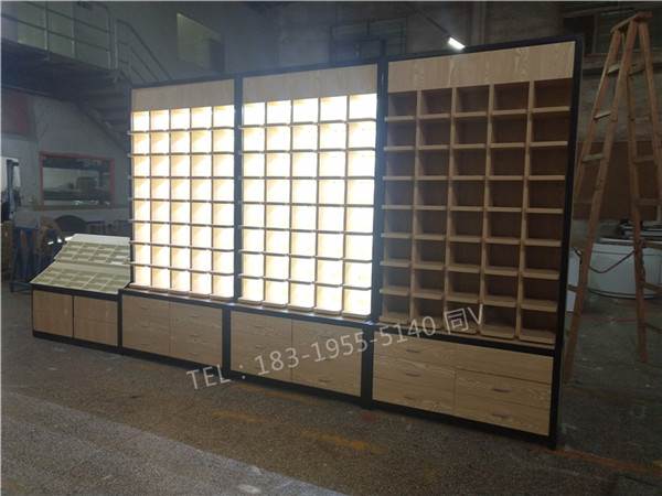 河南新乡多层格子太阳眼镜店货架/眼镜展示柜烤漆展柜图片大全