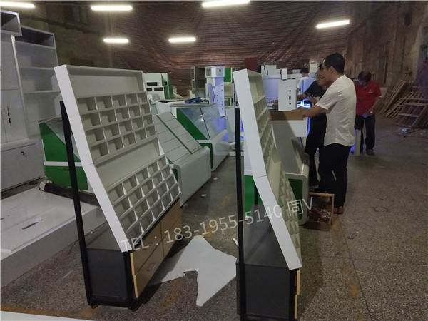 山东潍坊生态板眼镜柜/太阳镜中岛柜装修图片