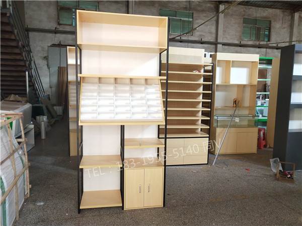 山东潍坊生态板眼镜柜/太阳镜中岛柜装修图片