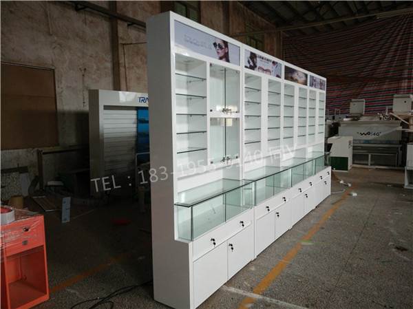 河南新乡多层格子太阳眼镜店货架/眼镜展示柜烤漆展柜图片大全