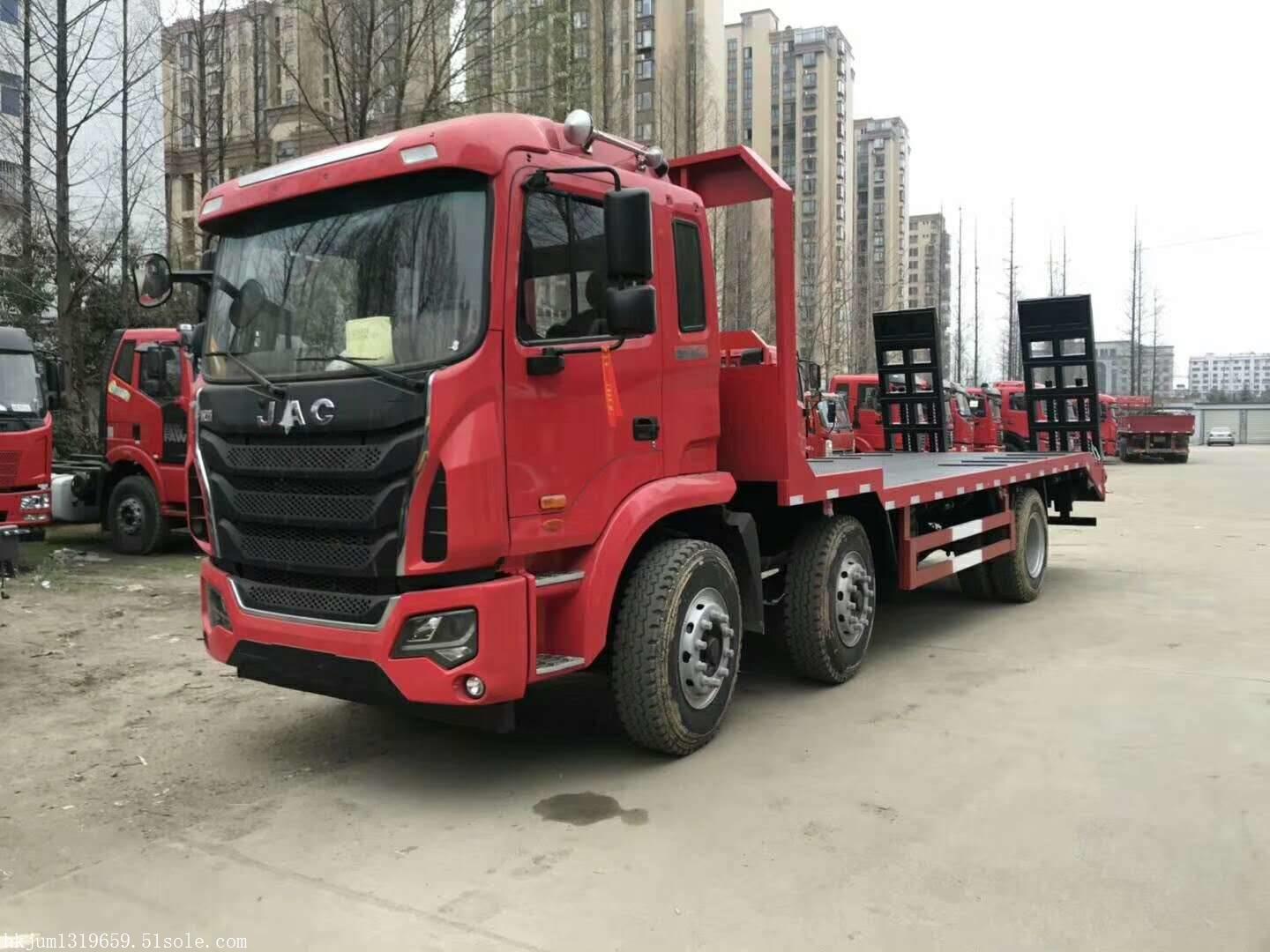 欧曼前四后八钩机平板拖车