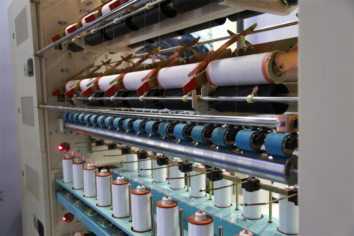 浙江万久精工全自动电脑包覆纱机