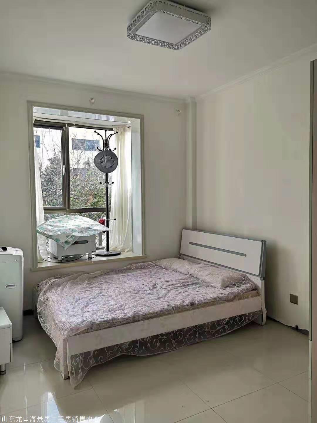 山东龙口海景房二手房中介公司碧海苑一层带花园精装好房32万