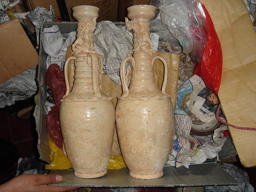 青釉龙纹魂瓶的近日拍卖信息